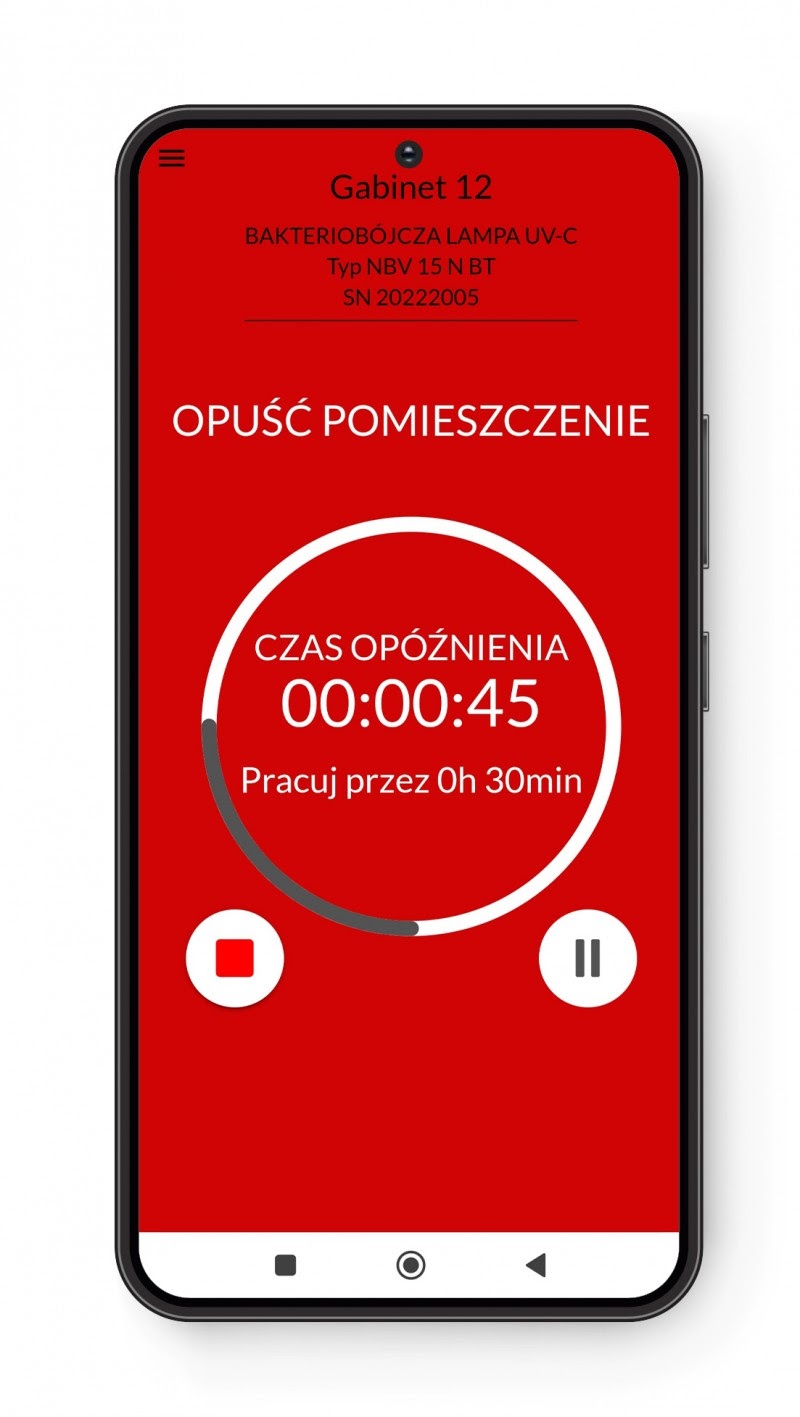 Czerwony ekran ostrzegawczy NBV App z komunikatem o konieczności opuszczenia pomieszczenia podczas odliczania startu.
